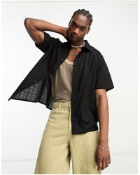 Reclaimed (vintage) - Chemise manches courtes en coton avec col à revers et broderie - noir - Lyst