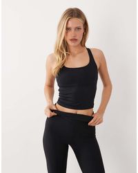 4505 - Active High Support Running Vest With Inner Bra And Adjustable Straps - Lyst