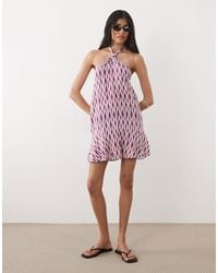Mango - – teen – neckholder-minikleid mit muster und bindegürtel - Lyst