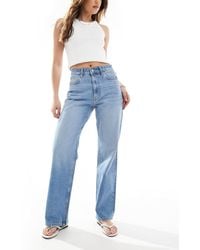 ASOS - – bequeme jeans mit geradem schnitt und stretchanteil - Lyst