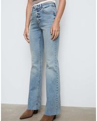 Stradivarius - Slit Fit Flared Jeans - Lyst
