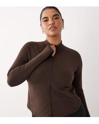 4505 - Curve Icon Soft Touch Zip Up Performance Long Sleeve Top - Lyst