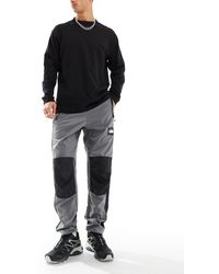 The North Face - Pantalones es y negros nse wind shell - Lyst