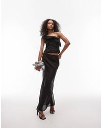 SNDY'S - Semi Sheer Front Split Maxi Skirt - Lyst
