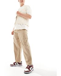 SELECTED - Pantaloni cargo beige ampi a cilindro - Lyst