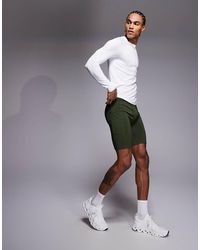 4505 - Icon Active Quick Dry Base Layer Training Half Tight With Phone Pocket - Lyst