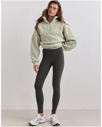 Aim'n - Dark Ivy Warming Pocket Tights - Lyst