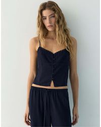 Pull&Bear - Crop top à fines bretelles bordé - Lyst