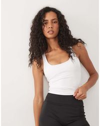 4505 - Active Scoop Neck Racer Back Vest With Inner Bra - Lyst