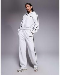 Kaiia - Cotton Rich Embroidered Logo Side Stripe Wide Leg Joggers Co-Ord - Lyst