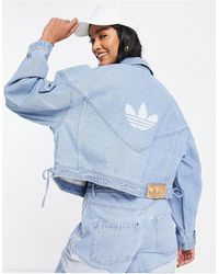 adidas Originals X Danielle Cathari Diagonal Side Stripe Denim Jacket in  Blue | Lyst Australia