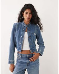 Calvin Klein - Veste courte en jean - Lyst