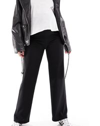 Mama.licious - Pantalones Negros Con Diseño Por Encima Del Vientre De Pernera Ancha De Canalé De Mamalicious Maternity - Lyst