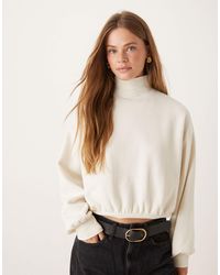 ASOS - Pull ultra-doux à col montant et manches ballon avec ourlet arrondi - crème - Lyst