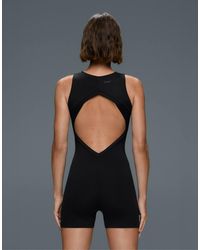 Oysho - Open-back Comfortlux Short Jumpsuit - Lyst