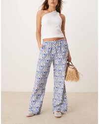 Jdy - Pantalon ample noué à la taille avec imprimé mosaïque - bleu - Lyst