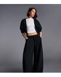 Bershka - Petite Modal Barrel Trousers - Lyst