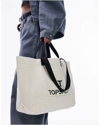 TOPSHOP - Tote Met Gedraaid 't'-logo Van Canvas - Lyst