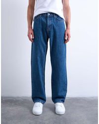 TOPMAN - Vaqueros Rígidos Holgados Con Lavado Medio De -Azul - Lyst