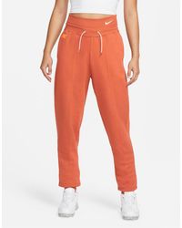 Orange Nike Activewear, gym and workout clothes for Women | Lyst