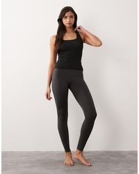 4505 - Seamless Rib Scoop Neck Vest With Racer Back - Lyst