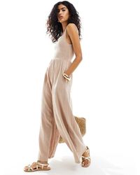 ASOS - Tuta Jumpsuit A Fondo Ampio Con Scollo Rotondo Color Tortora - Lyst