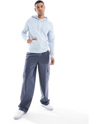 Polo Ralph Lauren - Loungewear - sweat à capuche zippé avec logo sur l'ourlet inférieur - clair - Lyst
