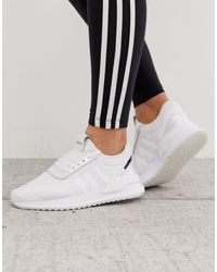 black adidas u path trainers