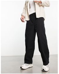 Carhartt - Colston - pantalon chino ample - noir - Lyst