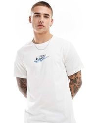 Nike - T-Shirt Bianca Con Stampa Grafica Del Logo Swoosh - Lyst
