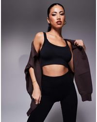 4505 - Reggiseno Sportivo A Supporto Medio Modellante Senza Cuciture - Lyst