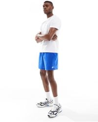 Nike - Pantalones Cortos Azules De Tejido De Rizo De Club - Lyst