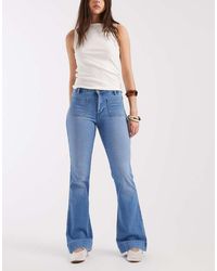 Wrangler - Vaqueros Medio De Corte Acampanado Con Bolsillos Delanteros - Lyst