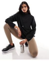 Nike - Nike - air dri-fit - giacca nera con zip corta - Lyst