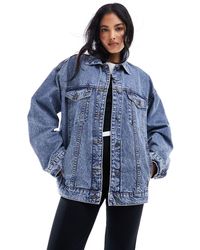 ASOS - Giacca di jeans oversize anni '90 lavaggio medio - Lyst