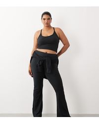 4505 - Curve Icon High Waist Slim Kick Yoga legging - Lyst