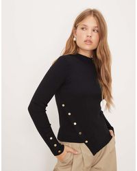Mango - Asymmetric Knitted Top With Gold Buttons - Lyst