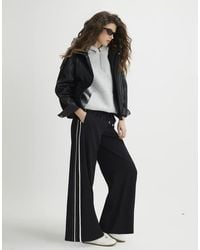 River Island - Stitch Side Stripe Joggers - Lyst