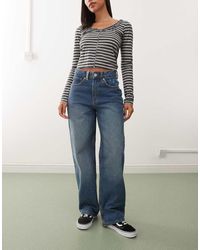 Vans - Pantalones Azul Añil Envejecido Con Bordado Sirelle De -Negro - Lyst