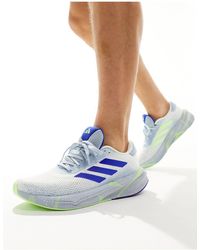 adidas Originals - Adidas running - supernova stride - baskets - blanc, bleu et vert - Lyst