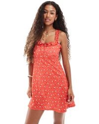 New Look - Robe courte à fleurs et volants avec liens sur le devant - Lyst