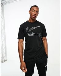 Nike - Dri-fit - t-shirt nera con grafica del logo - Lyst