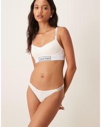 Calvin Klein - Icon Logo Dipped String Thong - Lyst