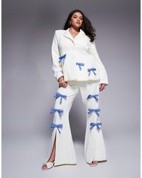 ASOS - Curve - pantalon d'ensemble habillé avec nœuds en denim - crème - Lyst