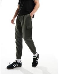 New Look - Pantalones cargo en con bajos ajustados - Lyst