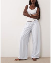 ASOS - Pantalon d'ensemble ample en crépon rayé avec cordon - Lyst