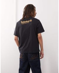 Timberland - Camiseta Negra Con Logo Estampado En La Espalda De - Lyst