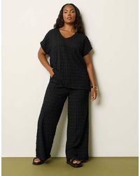 Yours Clothing - Bubble Textured Wide Leg Trousers - Lyst