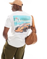 Hollister - Camiseta color holgada con estampado trasero - Lyst