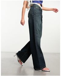 Weekday - Ample - jeans dritti ampi a vita bassa color palude - Lyst